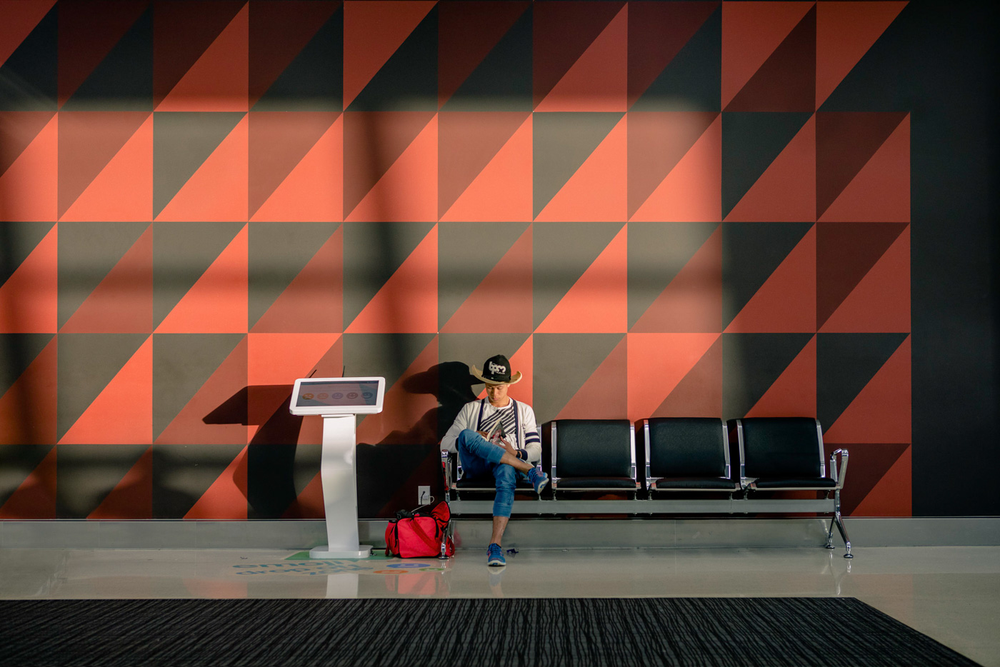 Last Photo of the trip and one of my favorites. Man waits for his plane at Auckland airport