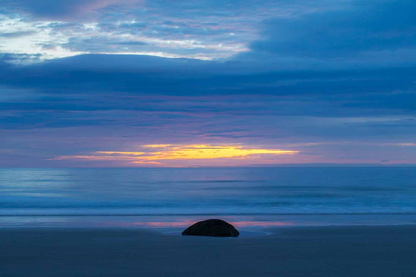 One of the more painterly views of Moeraki Boulders at sunrise