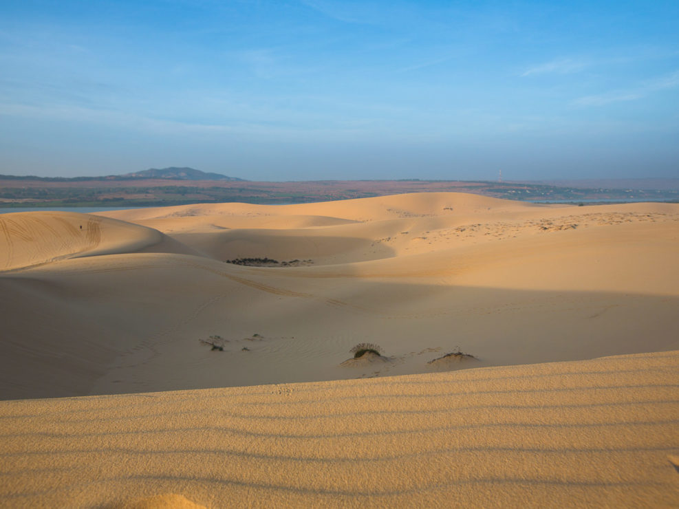 Intrepid Traveler on white sand dunes – Mui Ne, Vietnam