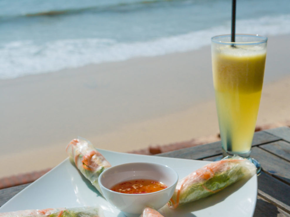 Traditional Vietnamese fresh spring rolls at beach cafe