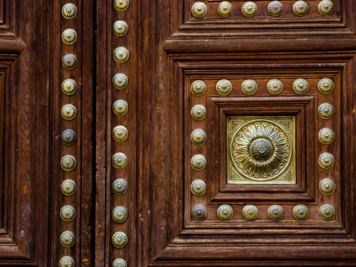 Weathered Spanish Door with Brass Designs