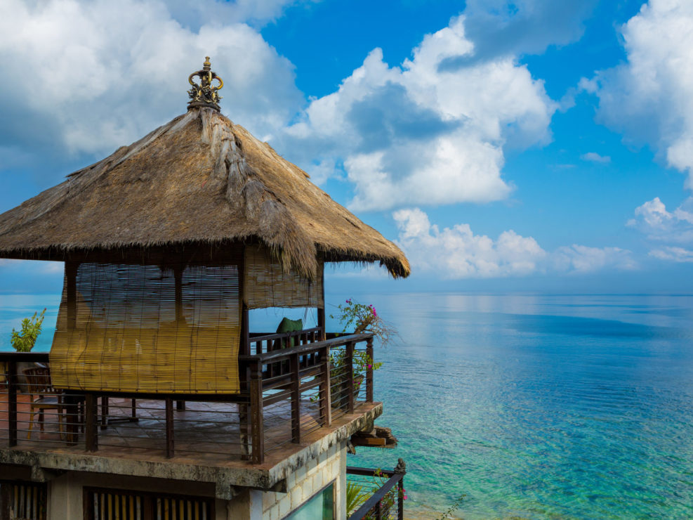 Straw hut over beach – Bali, Indonesia