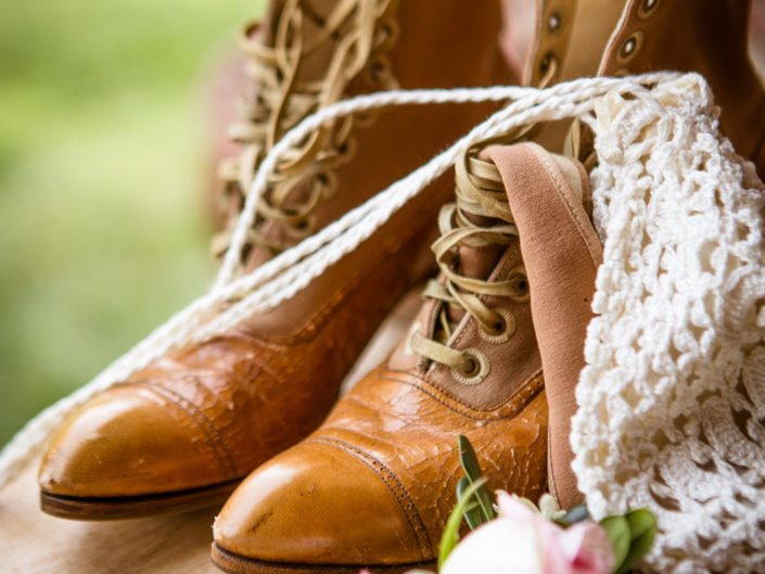 Still life of boots and flowers