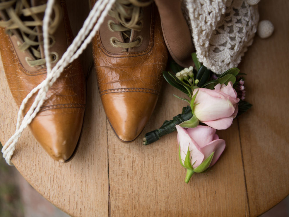 Still life of boots and flowers