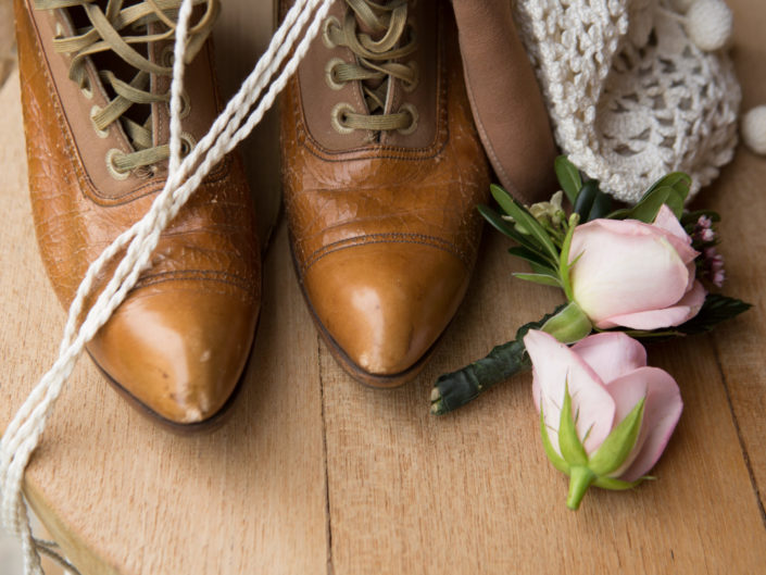 Still life of boots and flowers