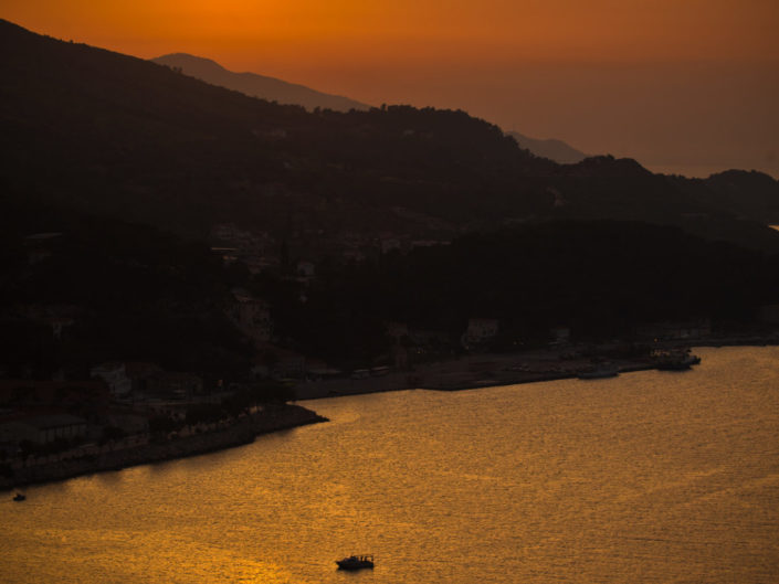 Mountain Sunset with Sailboat