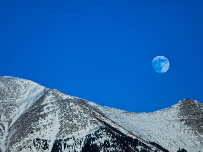 Moon Over Snowcapped Mountain – Colorado, USA