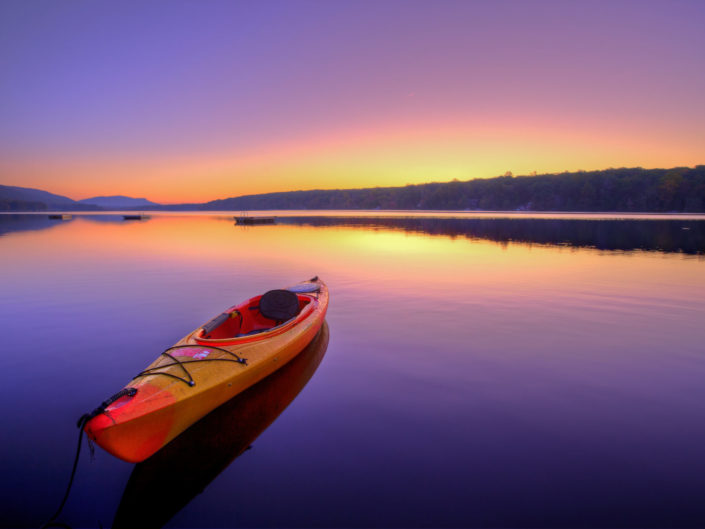 Kayak on Lake at Sunrise