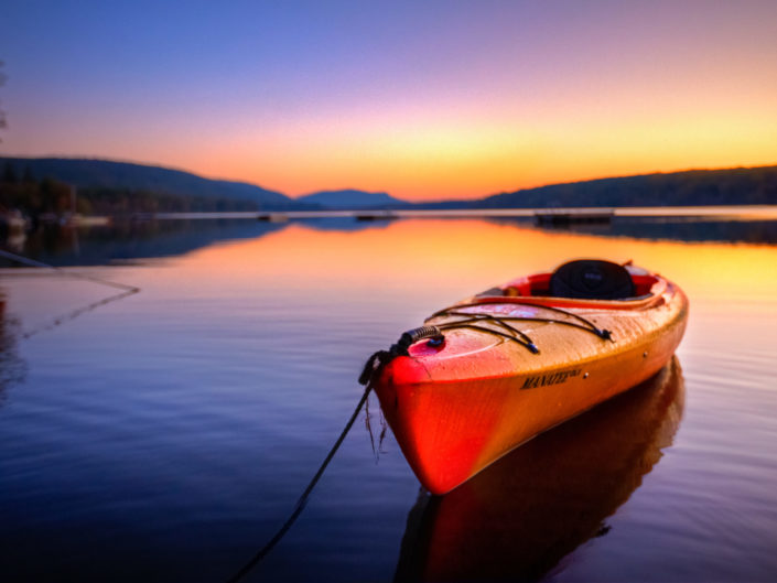 Kayak on Lake at Sunrise