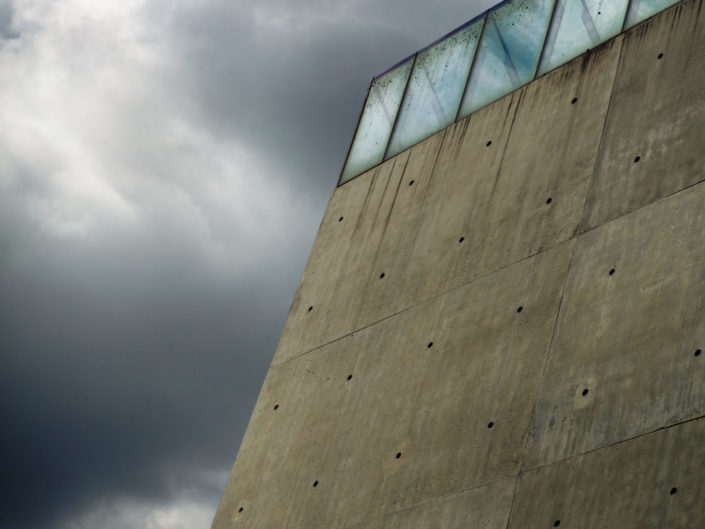 Yad Vashem wall against cloudy sky