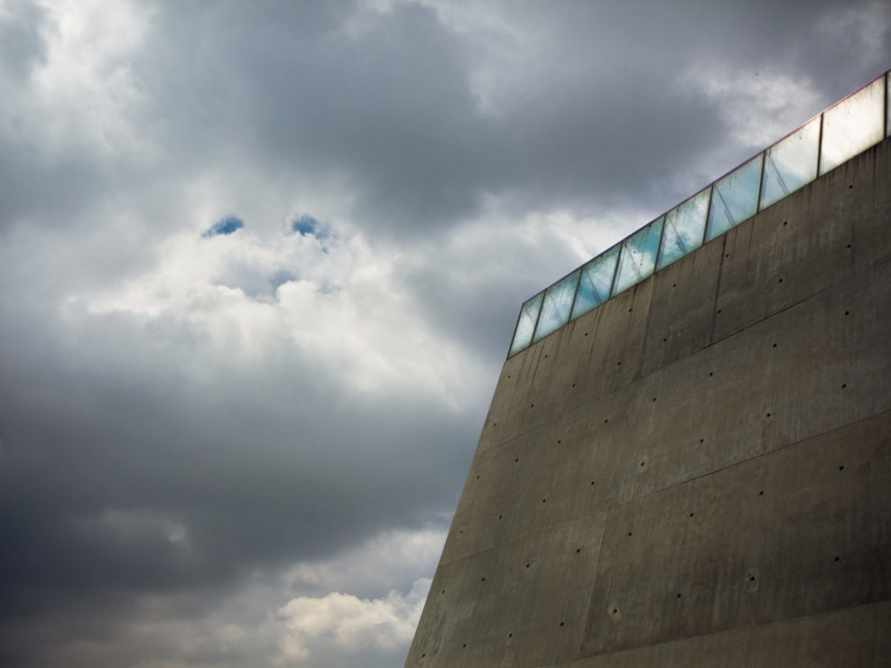 Yad Vashem wall against cloudy sky